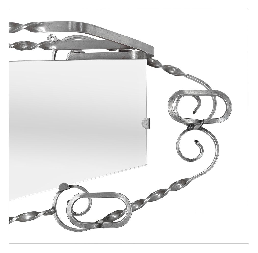 antique-wrought-iron-wall-coat-rack-with-mirror-detail